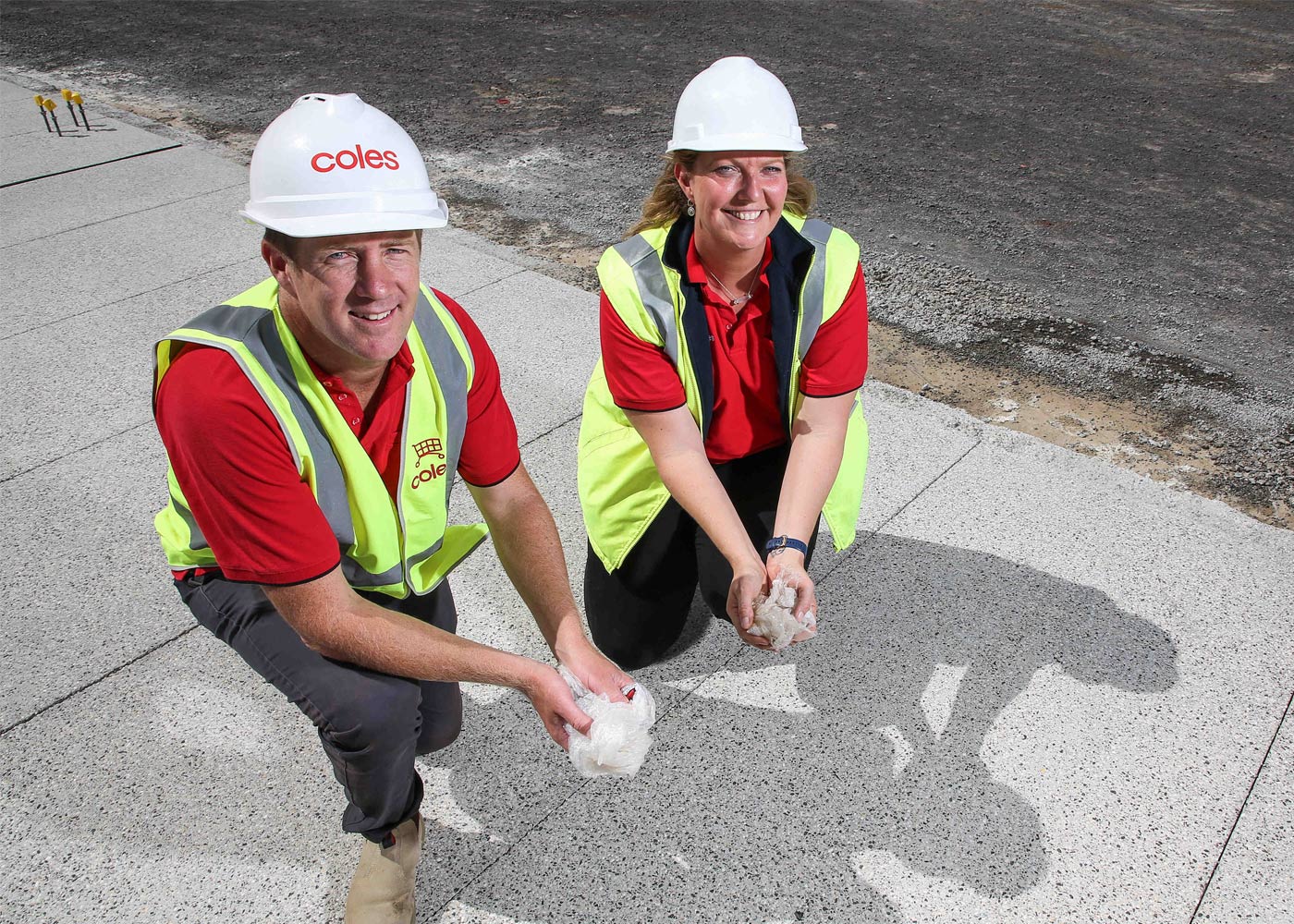 Coles Senior Project Manager Luke Hill with Coles State Construction Manager Victoria Fiona Lloyd at Coles Cobblebank with polyrok